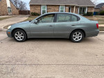 2003 Lexus GS 300 RWD with 55,000 miles, featuring heated leather seats and sunroof, parked on a residential street.