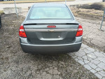 Rear view of a 2005 Chevrolet Malibu LS with low mileage, featuring recent detailing and paint work.