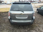 Back view of 2005 Chevrolet Equinox LT AWD parked, showing clean detailing and no visible issues.