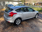 2013 Ford Focus S FWD in silver with 150,000 miles, well-maintained and garage-kept, featuring power locks and Bluetooth