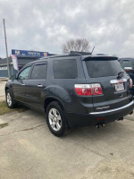 2011 GMC Acadia gray SUV with 61,000 miles, featuring a power lift gate and rear tow package.