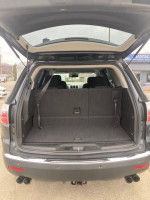 2011 GMC Acadia with spacious cargo area and power liftgate, ideal for families and hauling needs.