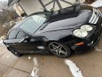 2008 Mercedes-Benz SL 550 convertible with 69,000 miles, needs suspension and radiator support repairs.