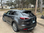 2019 Mazda CX-9 Grand Touring FWD, grey, showcasing sleek design and details, parked outdoors.