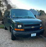 Green 2010 Chevrolet Express cargo van with 140,000 miles, featuring keyless entry and remote starter.