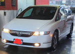 2007 Honda Odyssey mini van with 97,000 miles, 4WD, back-up camera, and in pristine condition.