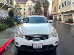 Front view of a 2008 Infiniti EX35 SUV parked in a residential area, showcasing its clean exterior.