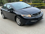 2015 Honda Civic LX FWD, black sedan with a clean exterior and low mileage, featuring Bluetooth and backup camera.