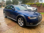 2013 Audi A4 Allroad Premium Plus in blue, 115,000 miles, with minor dents and new tires, parked outdoors.