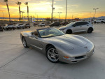 2001 Chevrolet Corvette convertible in Pewter Metallic with beige interior parked outdoors at sunset