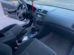 Interior view of a 2005 Honda Accord LX with clean dashboard and seats for sale