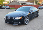 2010 Audi A5 3.2 Premium Plus quattro AWD coupe in black parked on a street