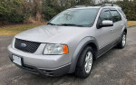 2007 Ford Freestyle wagon in gray, well maintained with new parts, clean interior, strong performance and great gas mileage.