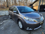 2011 Toyota Sienna Limited minivan with remote start and dual sunroofs parked in a driveway
