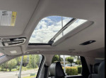 Interior view of 2023 Hyundai Palisades showing panoramic sunroof and premium seating.