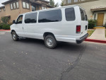 2004 Chevrolet Express 1500 AWD van parked outside, featuring a clean and spacious exterior.