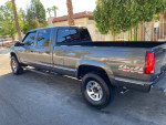 1999 GMC SLE K3500 4x4 truck in Storm Gray Metallic with low mileage and custom features