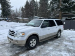 2009 Ford Expedition Eddie Bauer in white, spacious family vehicle with studded snow tires, reliable and well-maintained.