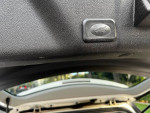 Interior view showing the trunk release button of a 2012 GMC Acadia SLE