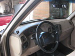 Interior view of a well-maintained 2000 F150 with low mileage and a clean finish.