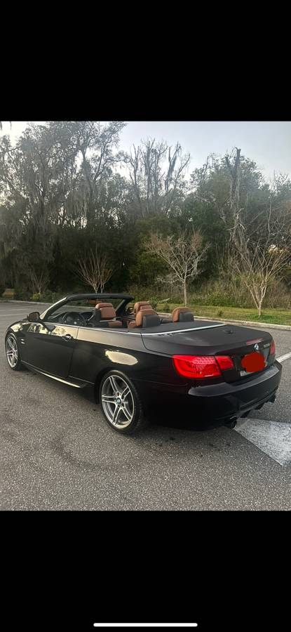 2011 BMW 335IS convertible in excellent condition, black exterior with brown leather interior, 120k miles.