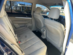 Interior view of a 2011 Subaru Outback showing rear seating and clean upholstery.