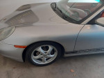 1997 Porsche Boxster with clean title, new tires, and red leather interior in excellent condition