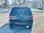 Rear view of a clean 2010 Ford Escape for sale with 92,000 miles, showcasing its reliable condition.