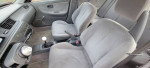 Interior view of a 1993 Honda Civic DX with manual transmission and grey upholstery