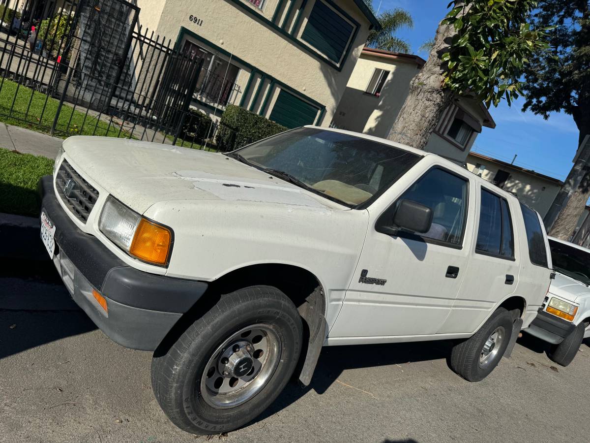 Honda Passport for sale, 79,000 miles, reliable stick shift with clean interior and current registration.