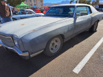 1970 Chevrolet Monte Carlo with original 402 engine at a car show, showcasing its classic design and vintage charm.