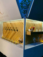 Mobile bar tap truck with six taps, wooden interior, and elegant beverage setup for events.