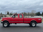 1997 Ford F250 in red with 4-wheel drive, displaying 257,000 miles, perfect transmission, and strong powerstroke engine.