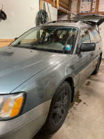 2002 Subaru Outback in good condition with new tires, manual transmission, and recent brake maintenance.