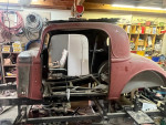1934 Pontiac Coupe body in restoration, showcasing unique split window design and solid parts available for sale.