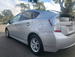 2010 Toyota Prius in excellent condition with low mileage, featuring new tires and leather interior.