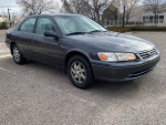 2000 Toyota Camry with 157k miles, gray exterior, reliable with recent maintenance.