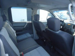 Interior view of a Nissan Titan 4x4 crew cab showing spacious seating and modern dashboard features