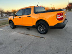 2023 Ford Maverick XLT in Cyber Metallic Orange parked, showcasing modern design and features for sale by private seller