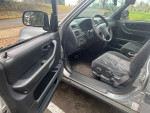 Interior view of a 2001 Honda CRV with automatic transmission and clean upholstery.