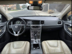 Interior view of a 2012 Volvo S60 T5 featuring leather seats and modern dashboard controls