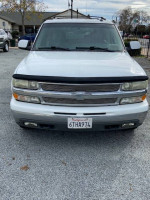 Front view of a 2003 Chevrolet Tahoe, white color, loaded LT model, all-wheel drive, 102,000 miles.