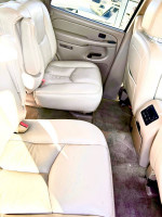Interior of a 2005 Chevrolet Tahoe LS 4WD showing cream leather back seats.