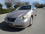 2007 Lexus ES 350 FWD in silver color, parked outdoors, highlighting its sleek design and clean exterior.