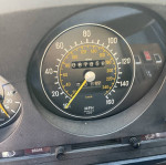 1979 Mercedes-Benz 450SL odometer reading at 87,858 miles, showcasing its original condition and recent maintenance.