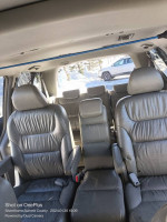Interior view of a well-maintained 2000 Honda Odyssey with spacious seating for seven.