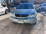 2008 Lexus RX 350 in excellent condition with light tan leather interior and navigation system.
