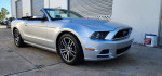 2014 Ford Mustang Convertible in silver with GT wheels, featuring a clean title and low mileage