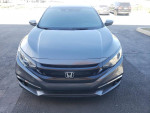 Front view of a grey 2019 Honda Civic Sport 4-door with salvage title and modern features for sale.