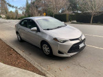 2017 Toyota Corolla L in excellent condition with new tires parked on the street